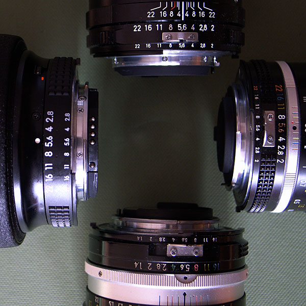 右から時計回りにAi Nikkor 35mm F2S、NIKKOR-S・C Auto 50mm F1.4 (Ai改) 、Ai AF Zoom-Nikkor ED 80-200mm F2.8D &lt;NEW&gt;、Carl Zeiss Distagon T* 2/28 ZF