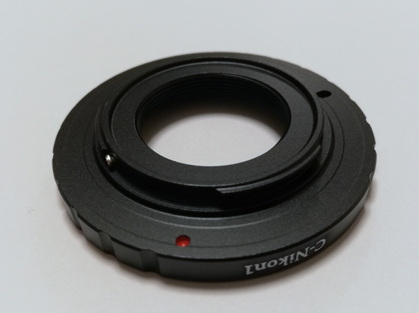 Aluminium Alloy Lens Mount Adapter Converter fr C-Mount Lens to Nikon 1 DSLR（DSLRと書いてあるが、Nikon １はDSLRではなくミラーレスデジタルカメラだ）